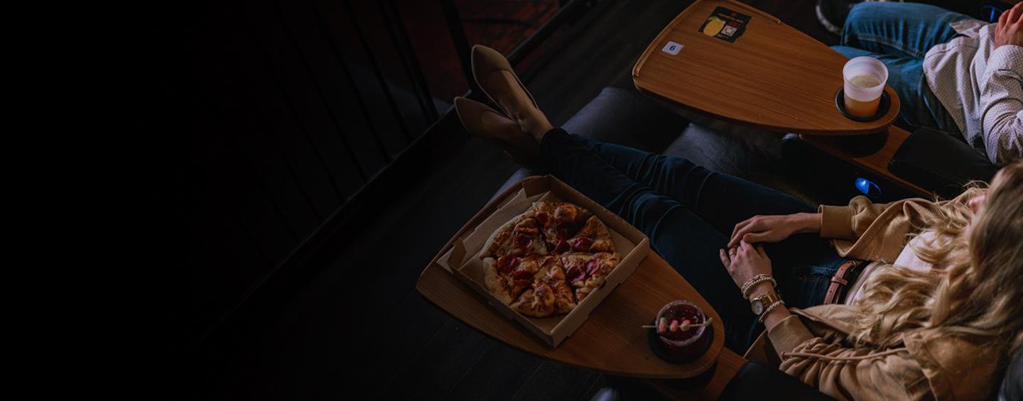 Couple eating at a dine-in theatre Desktop