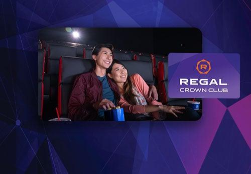 cute couple watching a movie with discounted popcorn