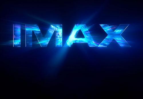imax logo with rays of blue light shining through