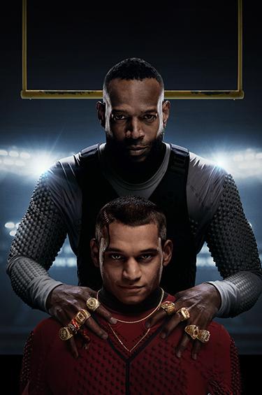 Isaiah standing behind Cam with his hands on his shoulders Mobile