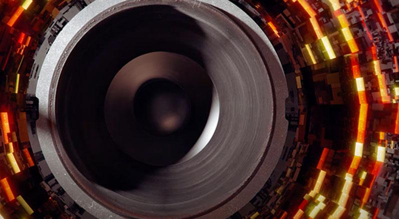 large speaker in space with 3D ground objects moving out from the speaker used in RPX movie theatres