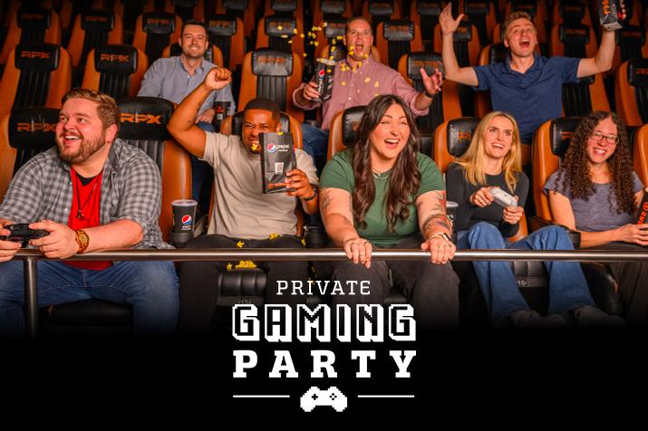 Friends at a private gaming party in a movie theatre