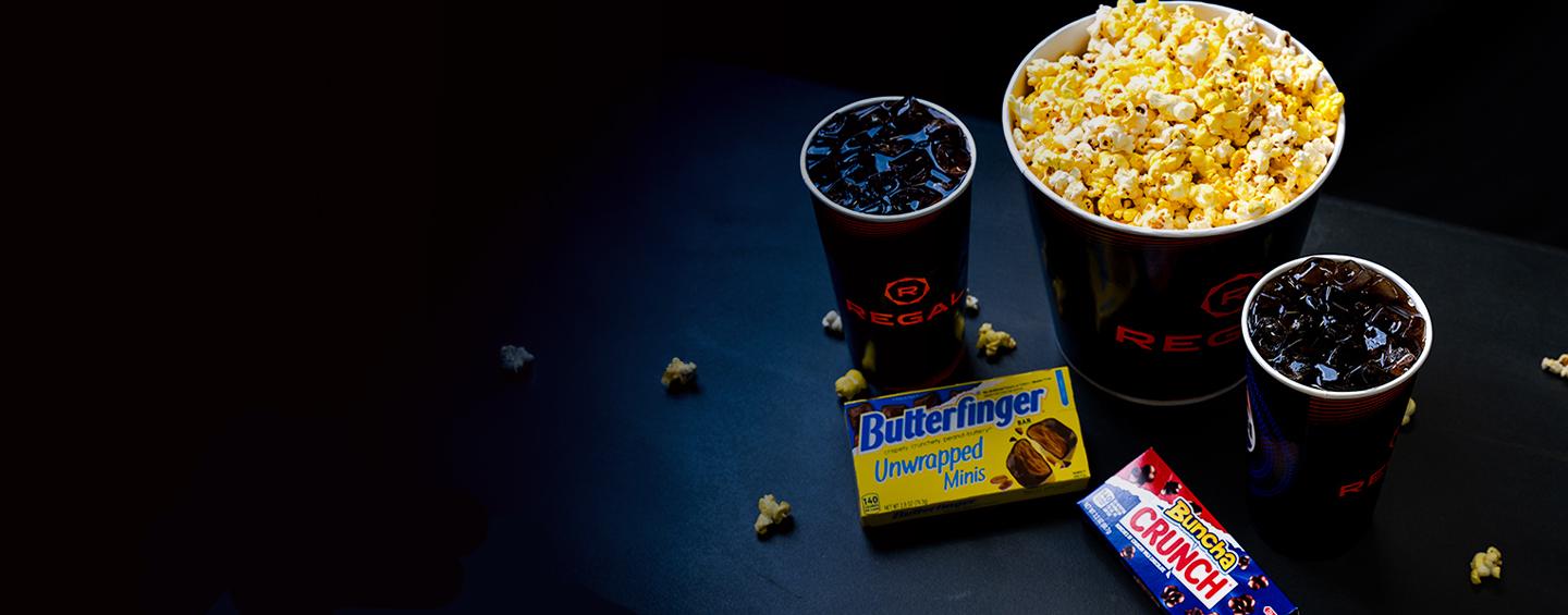 Get 2 soft drinks, a large popcorn and 2 candys in Regal's family concession combo Desktop