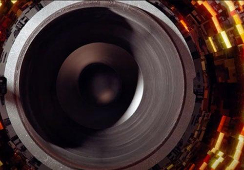 large speaker in space with 3D ground objects moving out from the speaker used in RPX movie theatres