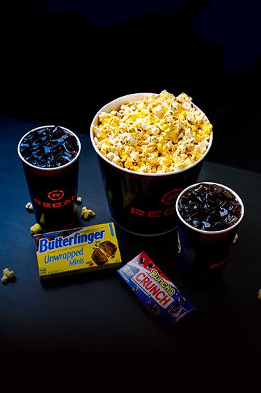 Get 2 soft drinks, a large popcorn and 2 candys in Regal's family concession combo Mobile
